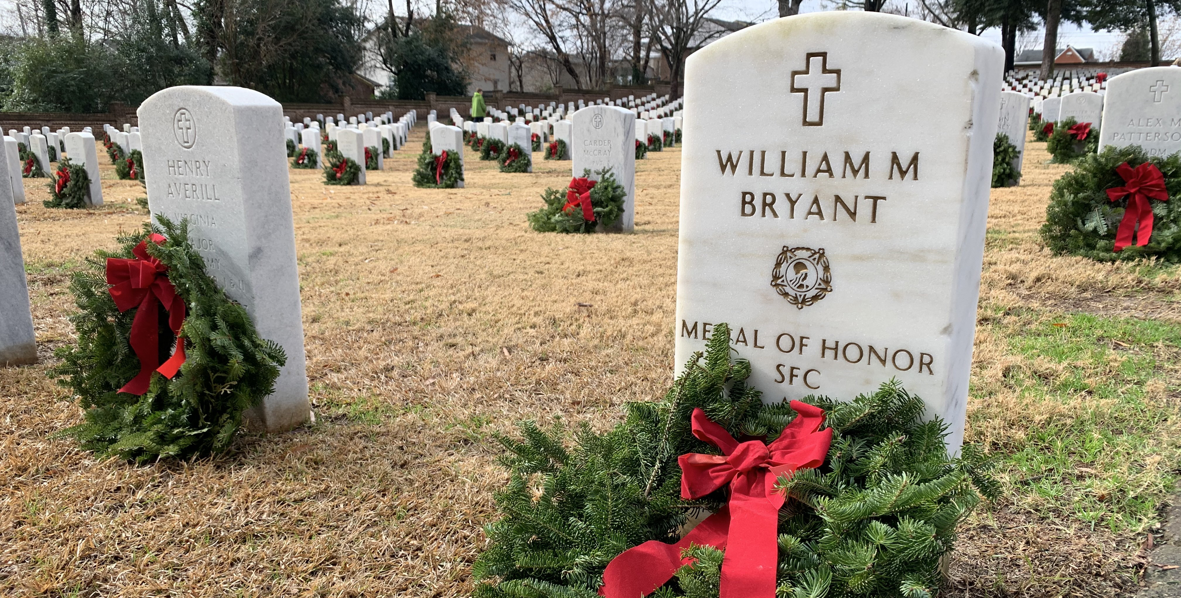 A wreath lies at the grave of Army Sgt. 1st Class William M. Bryant during the 2019 Wreaths Across America event at Raleigh National Cemetery, North Carolina. VA photo by Adam Stump.