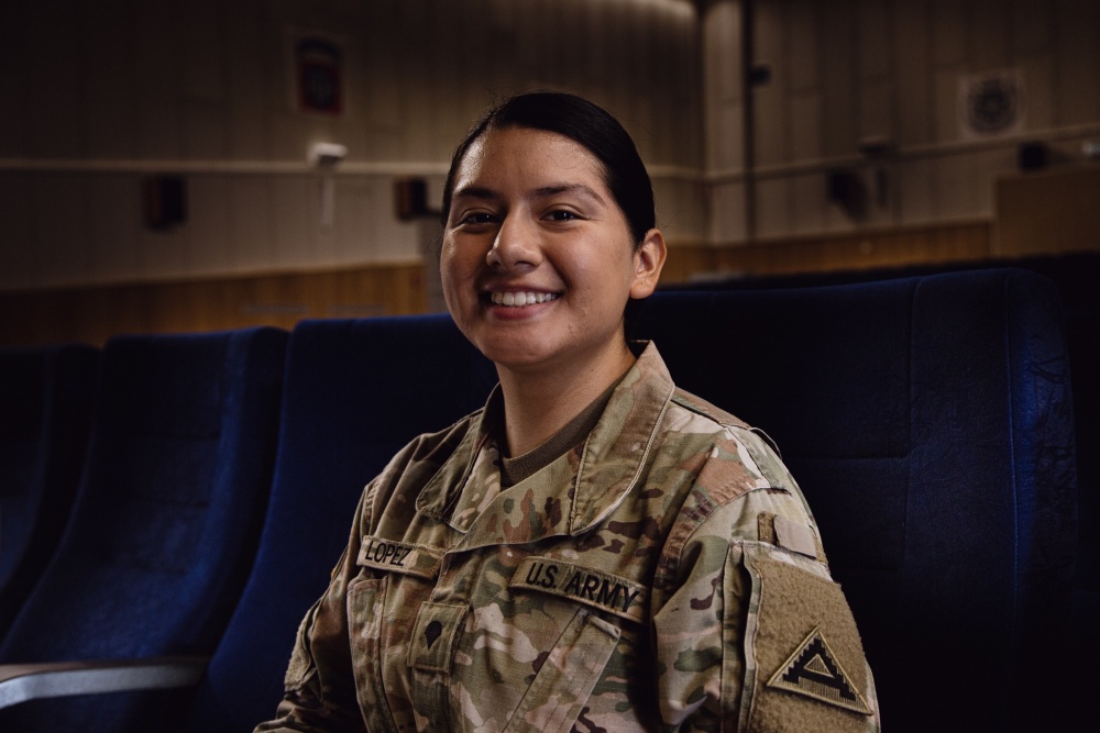 Smiling woman soldier in uniform