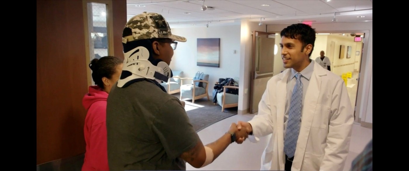 Veteran shakes hand with doctor