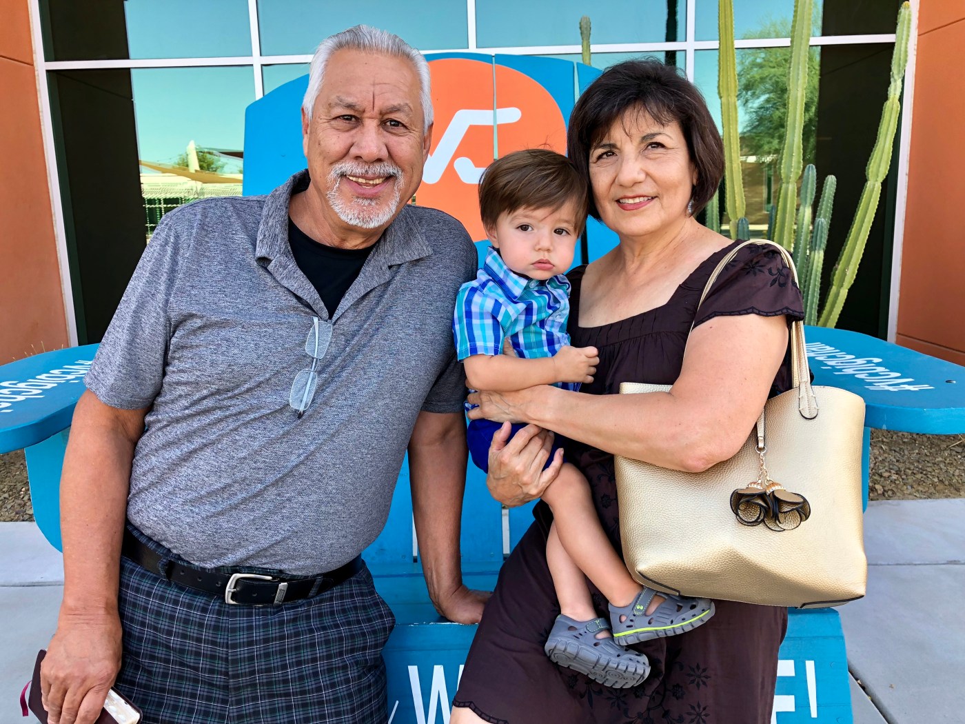 John Gutierrez (left) with his wife, Rosalinda Gutierrez, and their grandson, Quentin Gutierrez, in Phoenix in 2018.