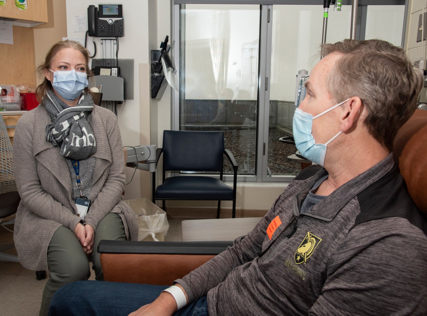 Dr. Julie Graff, an oncologist at the Portland VA, consults with Army Veteran David Atkinson. She’s using precision oncology to treat his aggressive prostate cancer.