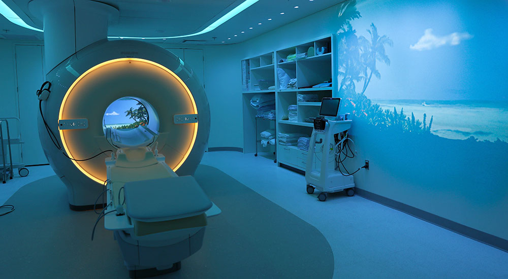 Modern MRI machine in cool blue room