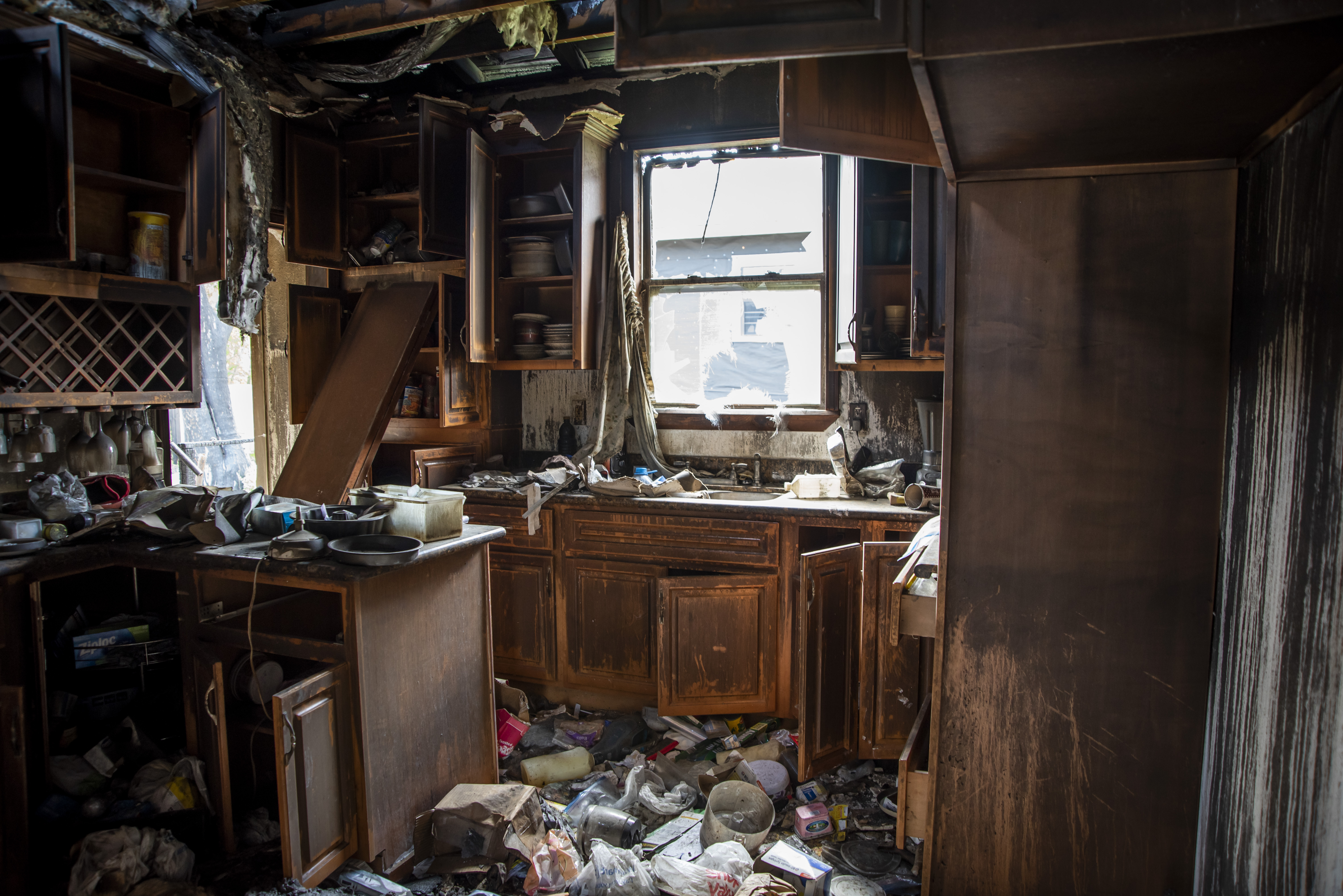 Image of charred kitchen after a home fire.