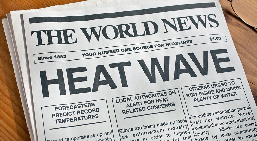 Heat Wave headline on a newspaper.