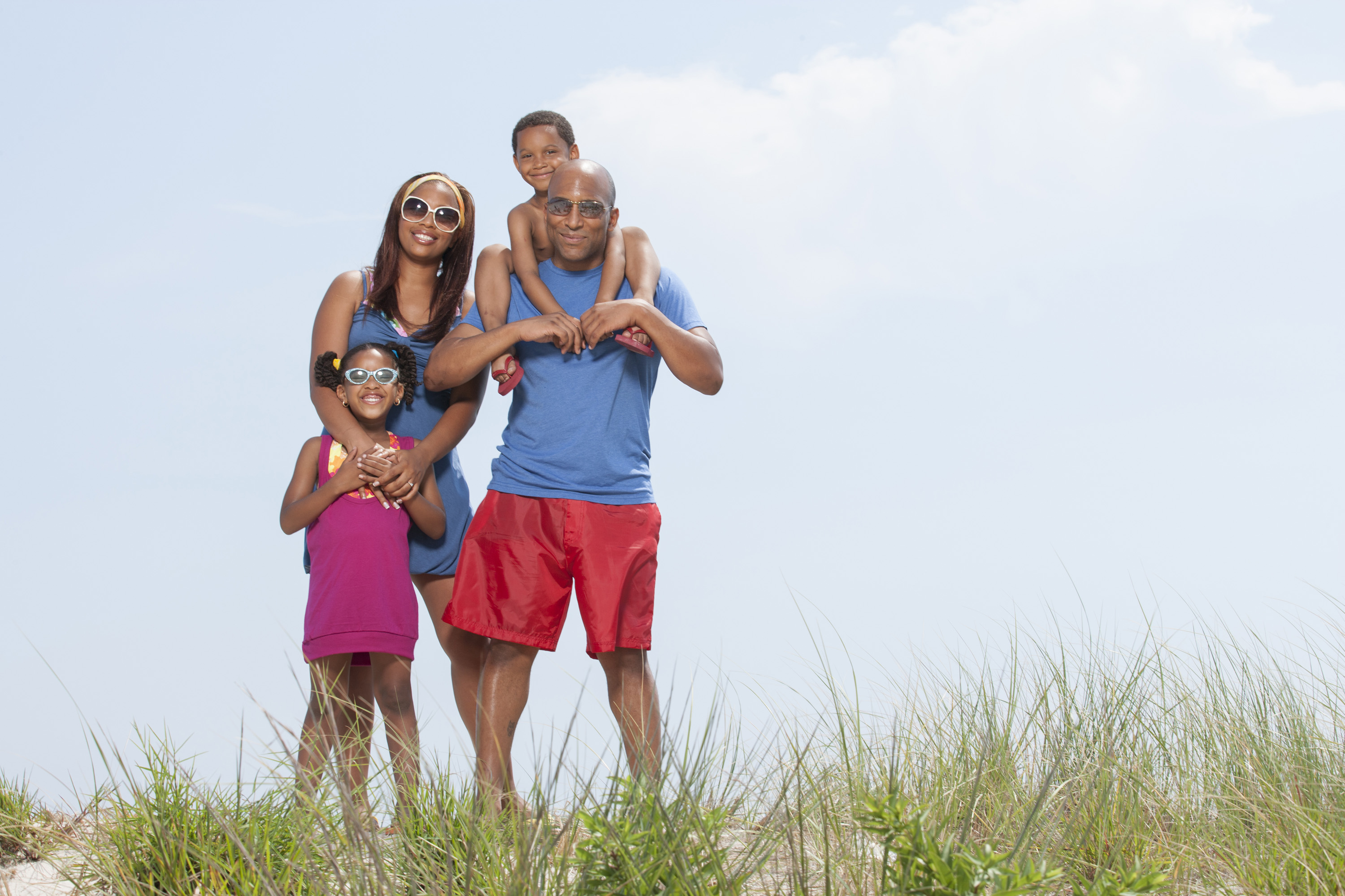 Family at the beach. Veterans travel deals