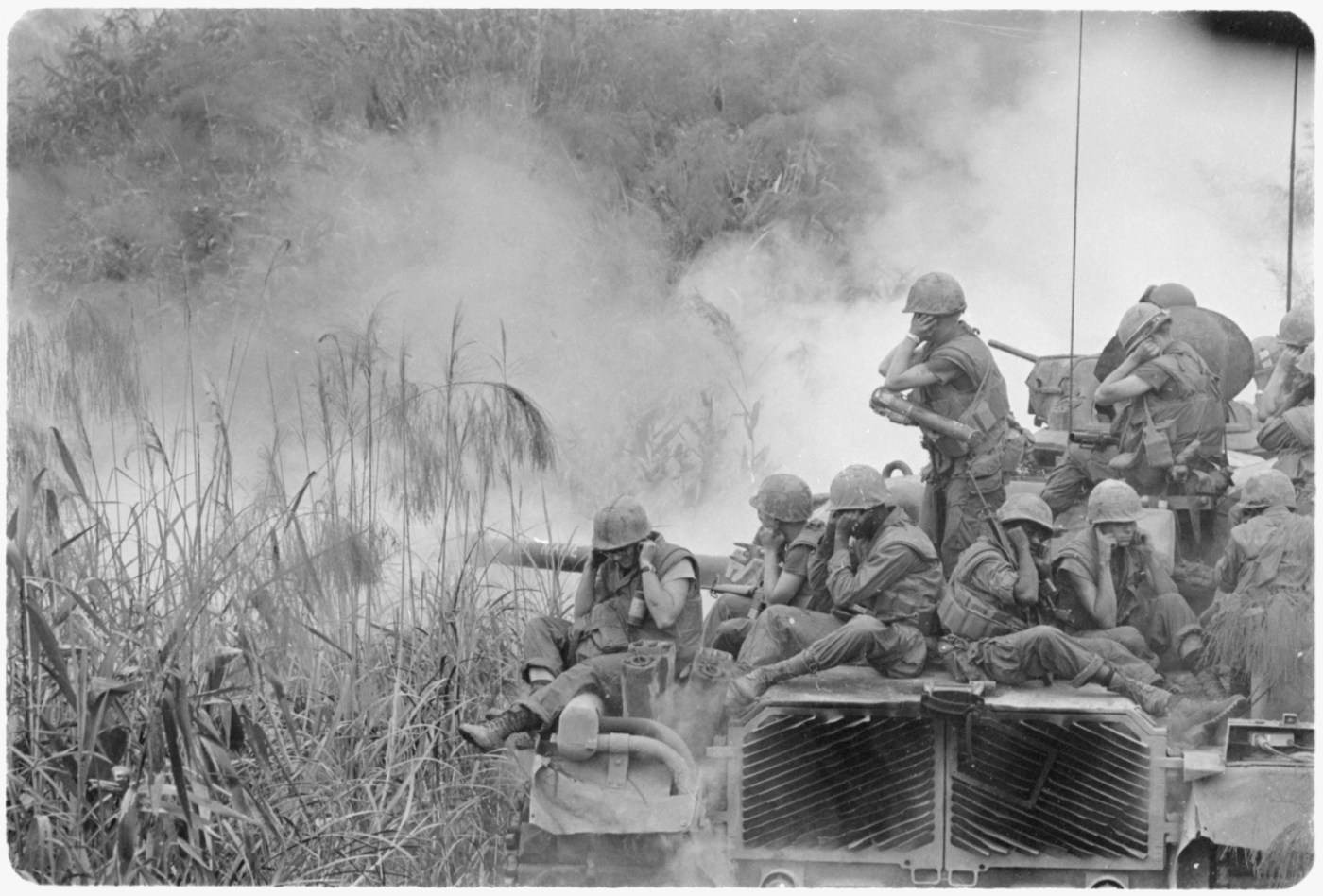 A new analysis of data from the Vietnam era found that LGB Veterans who served at the time are reporting PTSD and poorer mental health more often than their heterosexual counterparts. Here, Marines ride atop a tank during a road sweep near Phu Bai in central Vietnam.