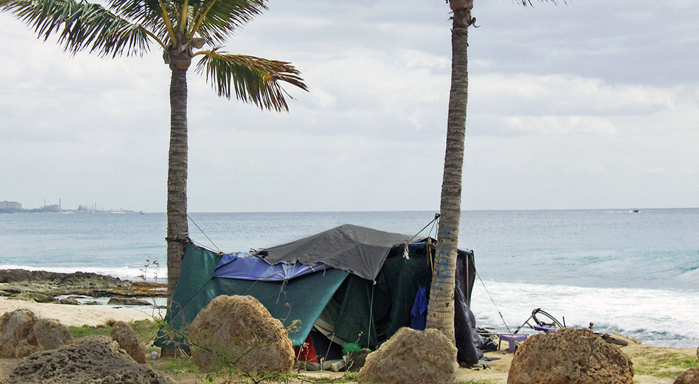 Homeless Veteran tent on a Hawaii beach