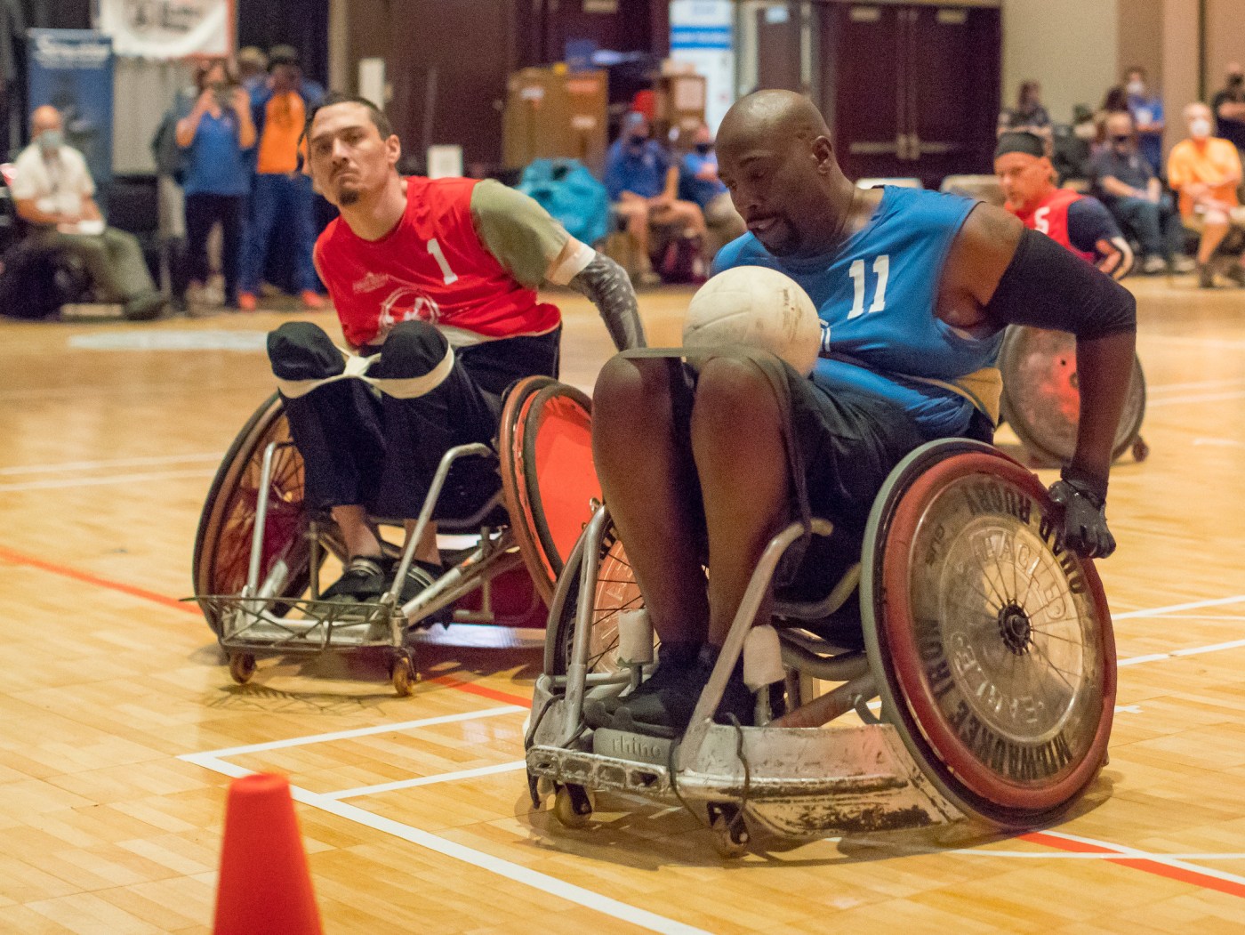 Johnny Holland, here on the verge of scoring, came out of retirement to play wheelchair rugby for the first time in 15 years.
