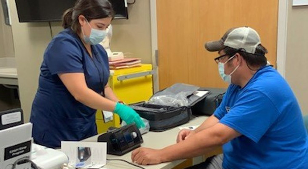 Nurse preparing Veteran for sleep study