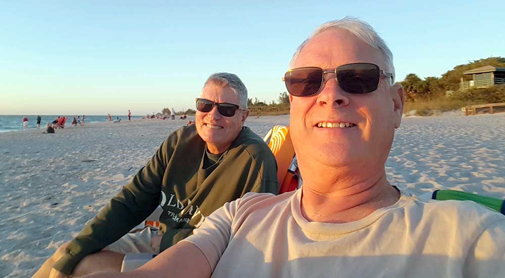 Two men on a beach in Florida, formerly depressed