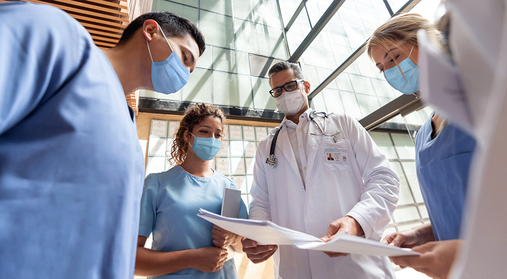 Doctors and nurses confer at Partnership Challenge