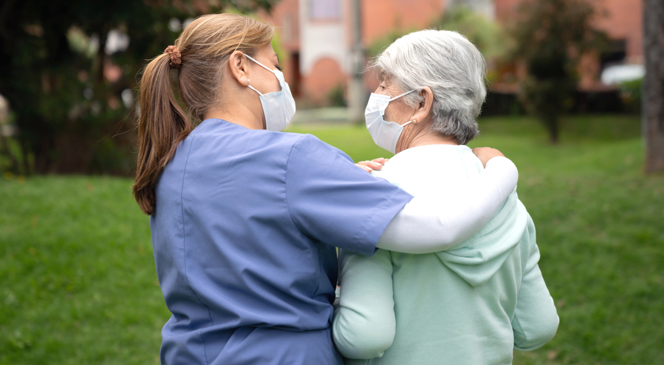 nurse assisting aging female Veteran