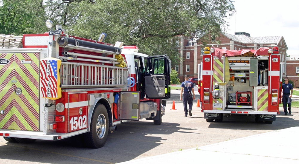 Two VA fire trucks and firemen