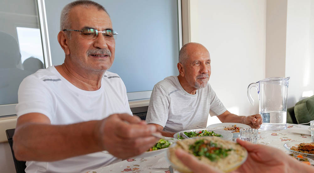 Man being served a holiday meal