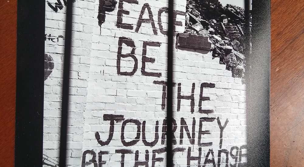 Peace painting on brick wall
