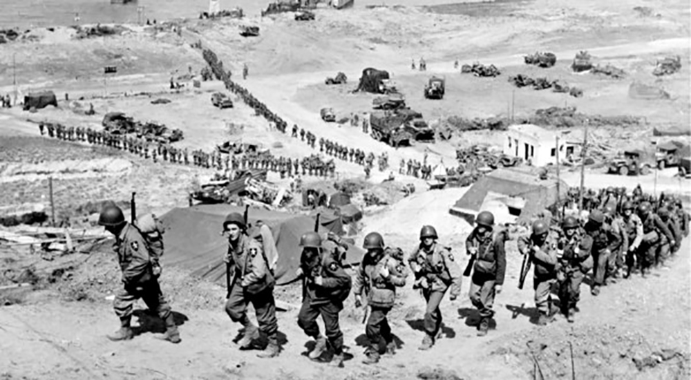 Troops arriving on Normandy Beach in 1944