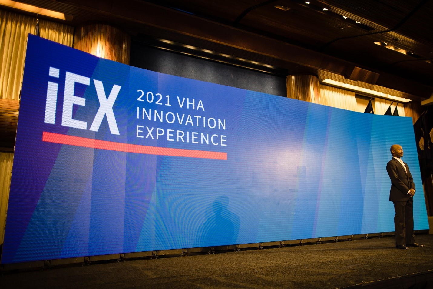 VHA Innovation Experience Header image mand on stage