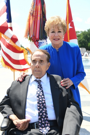 IMAGE: Bob Dole and his wife, Elizabeth Dole, pose for a photo during an honorary promotion ceremony in honor of Bob Dole at the World War II Memorial in Washington, D.C., May 15, 2019. (U.S. Army photo by Spc. Dana Clarke)