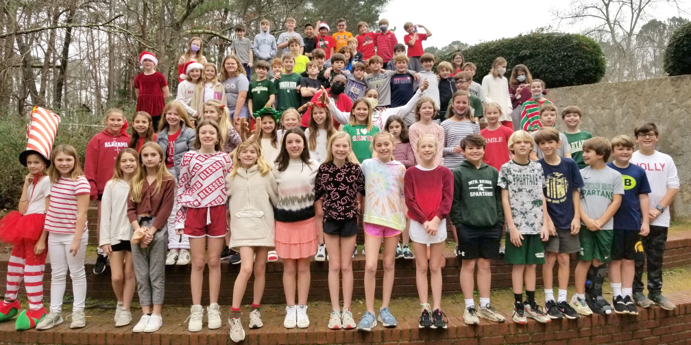 Many fifth and sixth grade kids who participated in Wrapping for America's Warriors on a hill