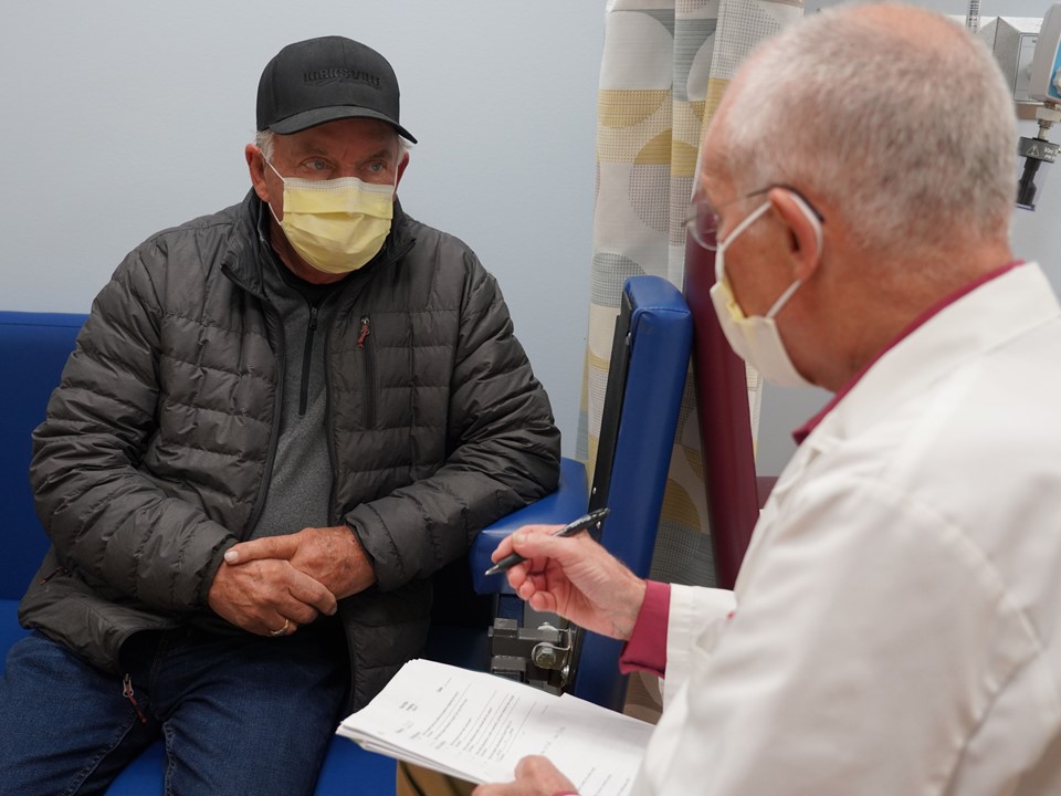 Dr. Thomas Dresser (right), a nuclear medicine physician at the Truman VA in Missouri, consults with Air Force Veteran Kenneth Stufflebean, who is being treated for prostate cancer.