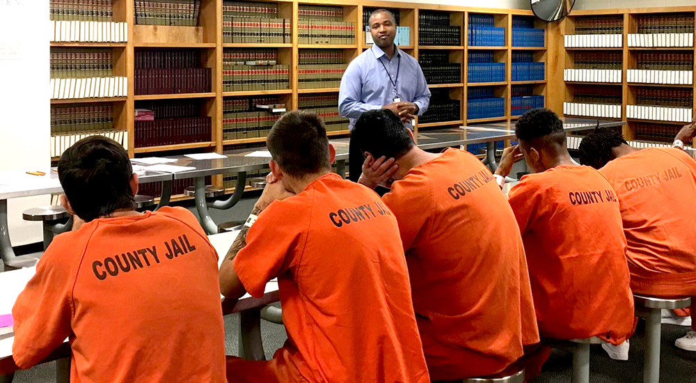 Justice Outreach specialist addresses several prison inmates