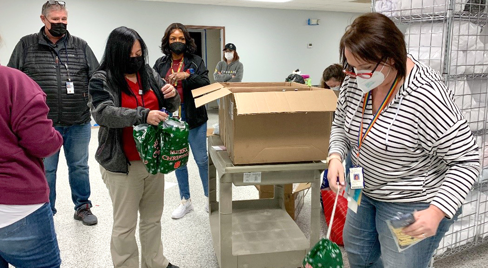 People preparing personal hygiene bags before leaving for PIT count