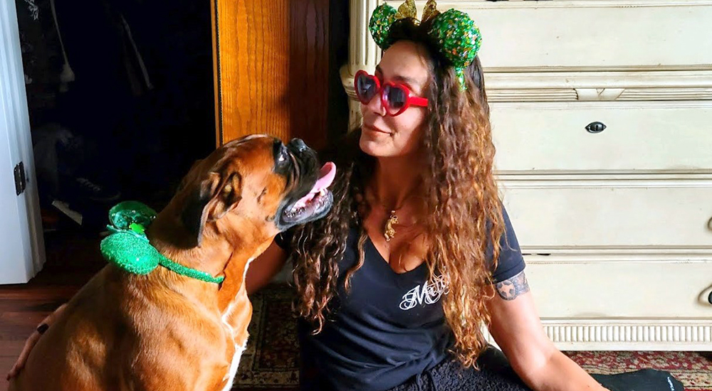 Lady Veteran with her service dog