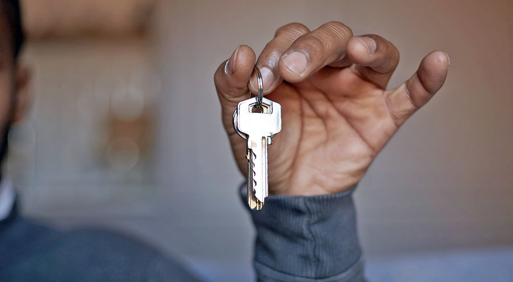 Hand holding a set of keys