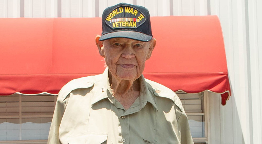 Senior Veteran in WWII cap celebrates his 99th birthday