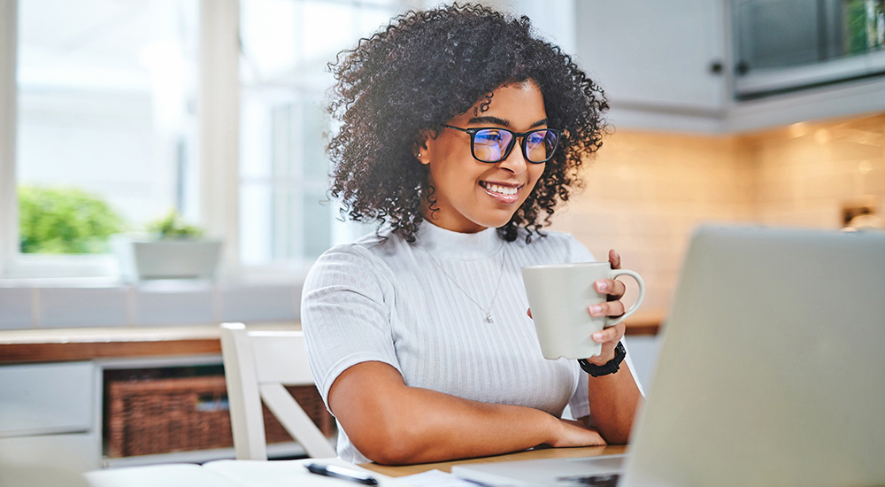 Smiling woman taking online Veteran Mental Health Resources training