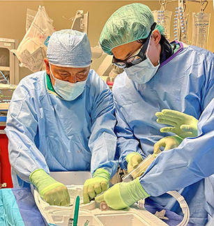 Houston team prepares Amulet device catheter delivery system for insertion into the heart. 