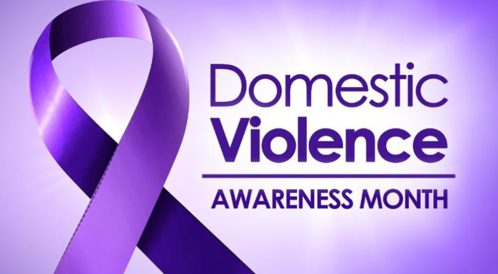 Purple domestic violence prevention ribbon banner with text