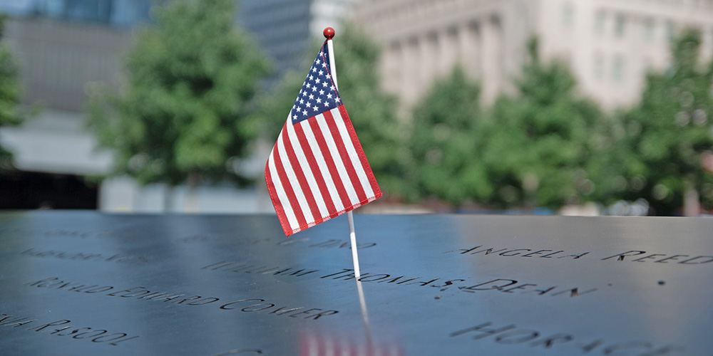 Small American flag on 9/11 monument