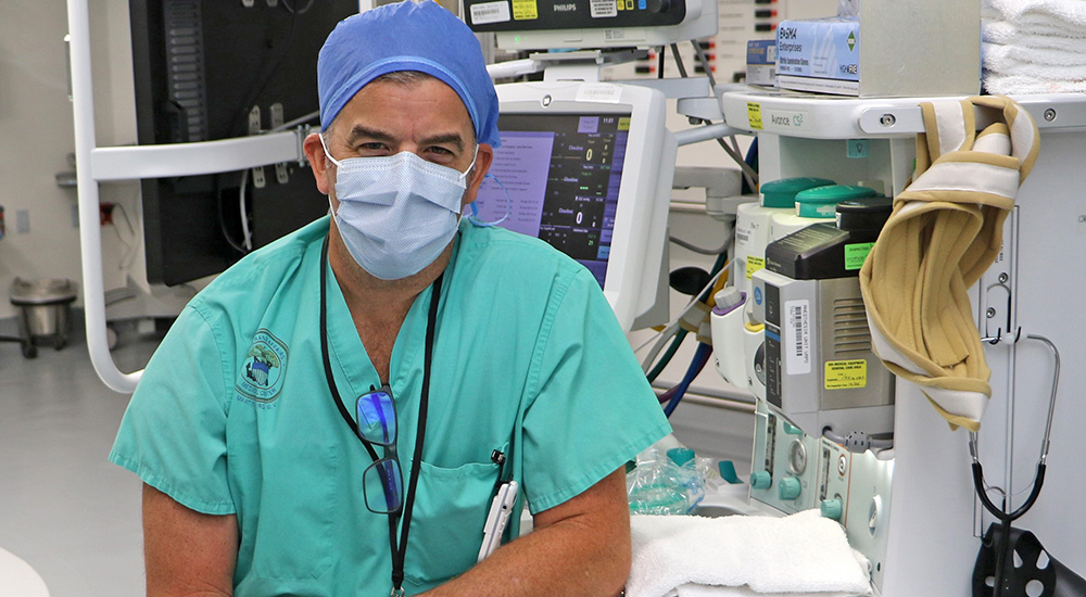 VA nurse wearing mask in operating room