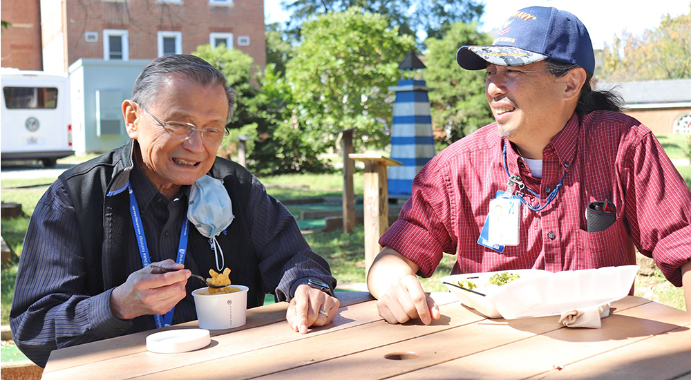 Father and son VA doctors having lunch