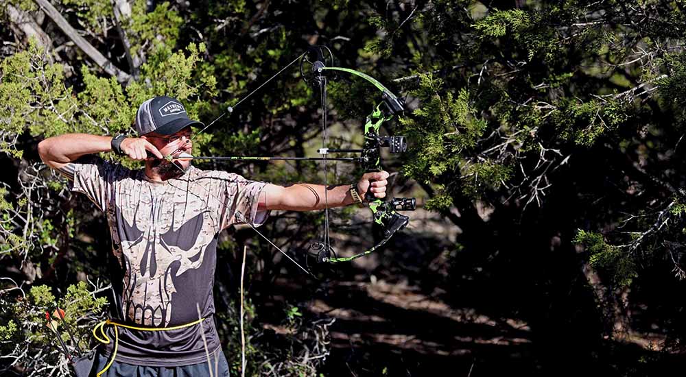 Bows, arrows, outdoors, provide therapy at archery match