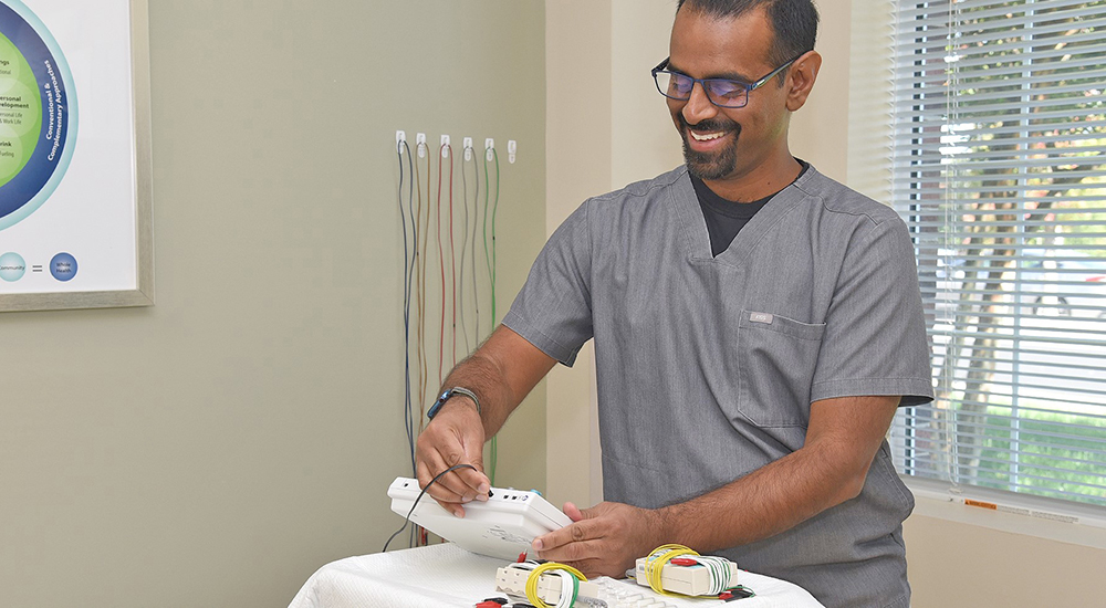 VA doctor prepares acupuncture treatment