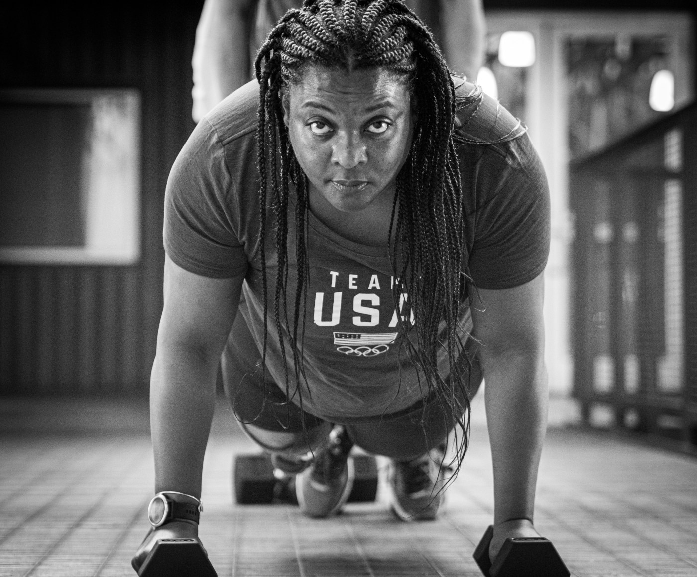 woman veteran doing pushups during fitness routine
