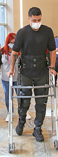 Veteran walking with robotic suit