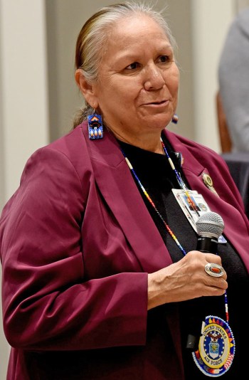 Tribal woman speaking at summit