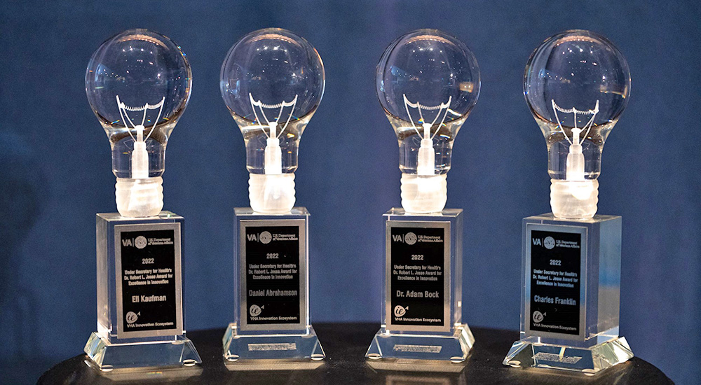 Four Jesse awards in light bulb shape