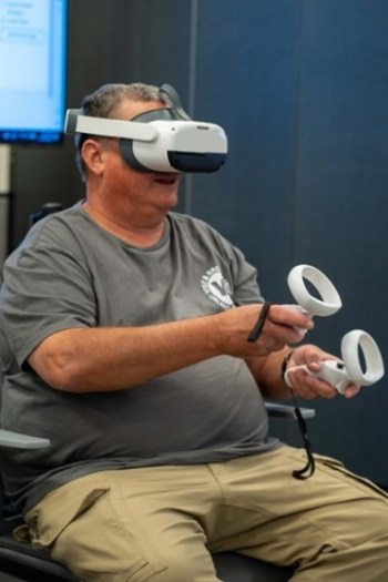 Veteran eXpeRience male Veteran using VR.
