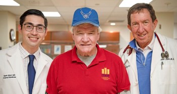 Veteran patient with two doctors 