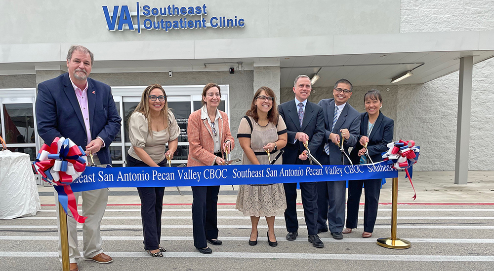 People cutting ribbon at new San Antonio clinic