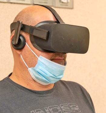 Patient wearing virtual reality headset