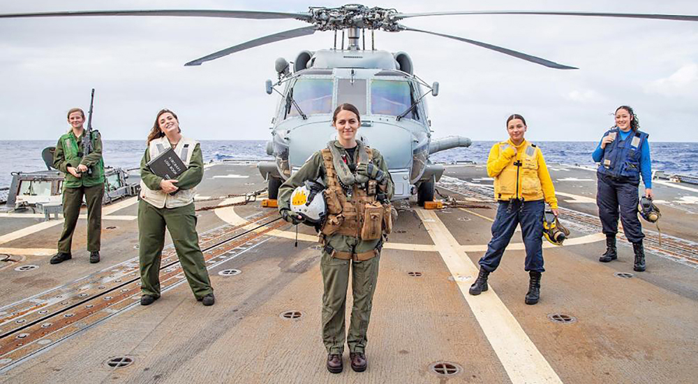 Five women Veterans on aircraft carrier