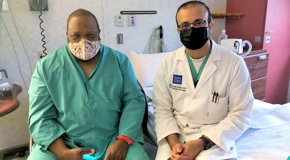 Veteran patient with his doctor; blood clot removed