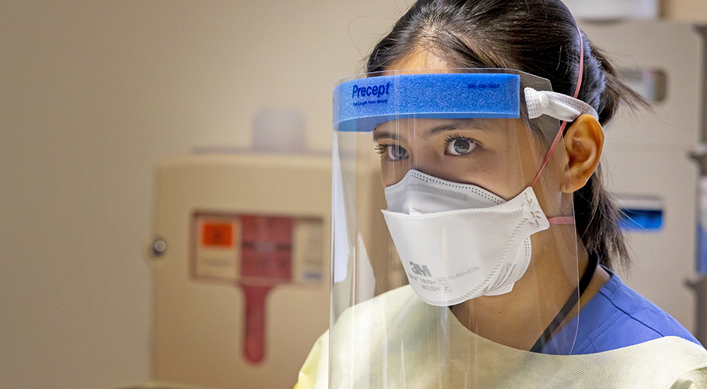 Nurse in surgical mask; train Chicago providers