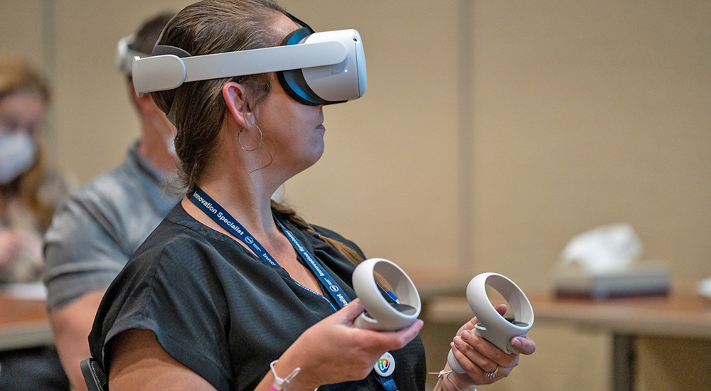 A VA employee participates in a VR training program