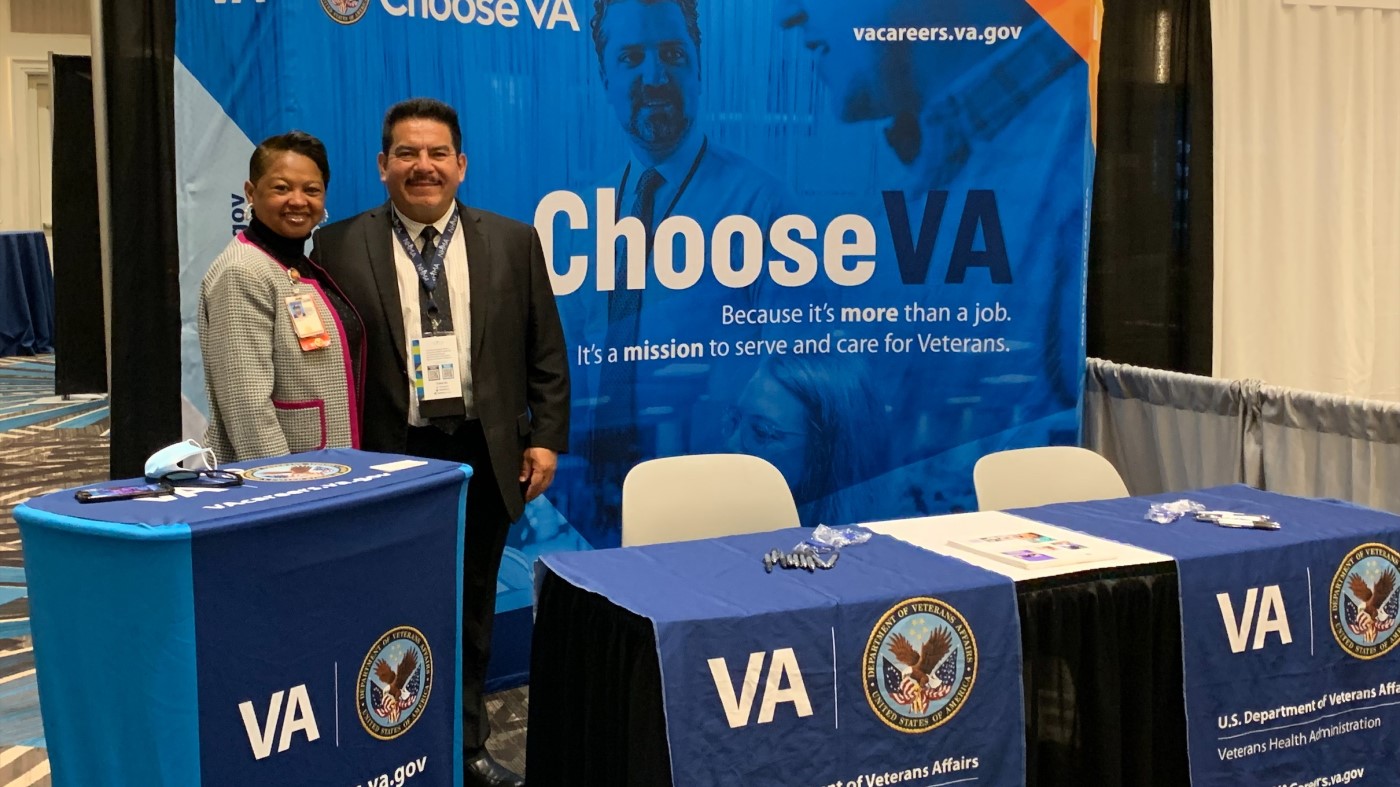 VA recruiters attending a convention.